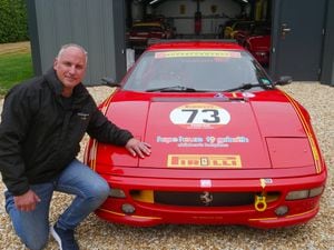Tim Walker with the Ferrari bearing the Hope House logo