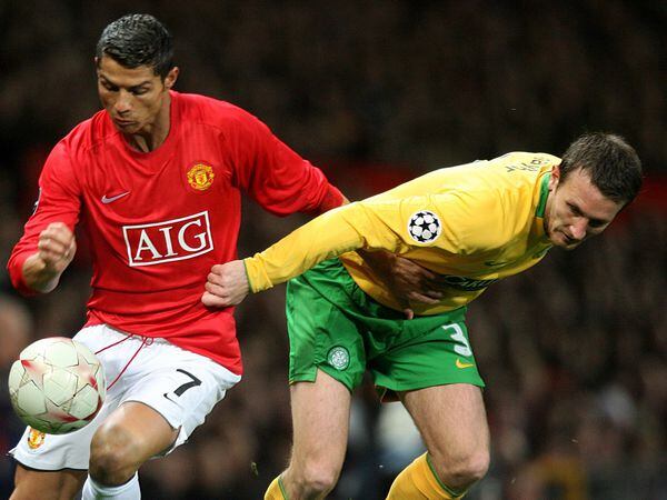 Manchester United's Cristiano Ronaldo (left) and Celtic's Lee Naylor battle for the ball..