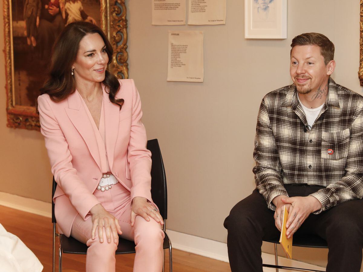 The Princess of Wales sits beside Professor Green during a visit to the Foundling Museum in London