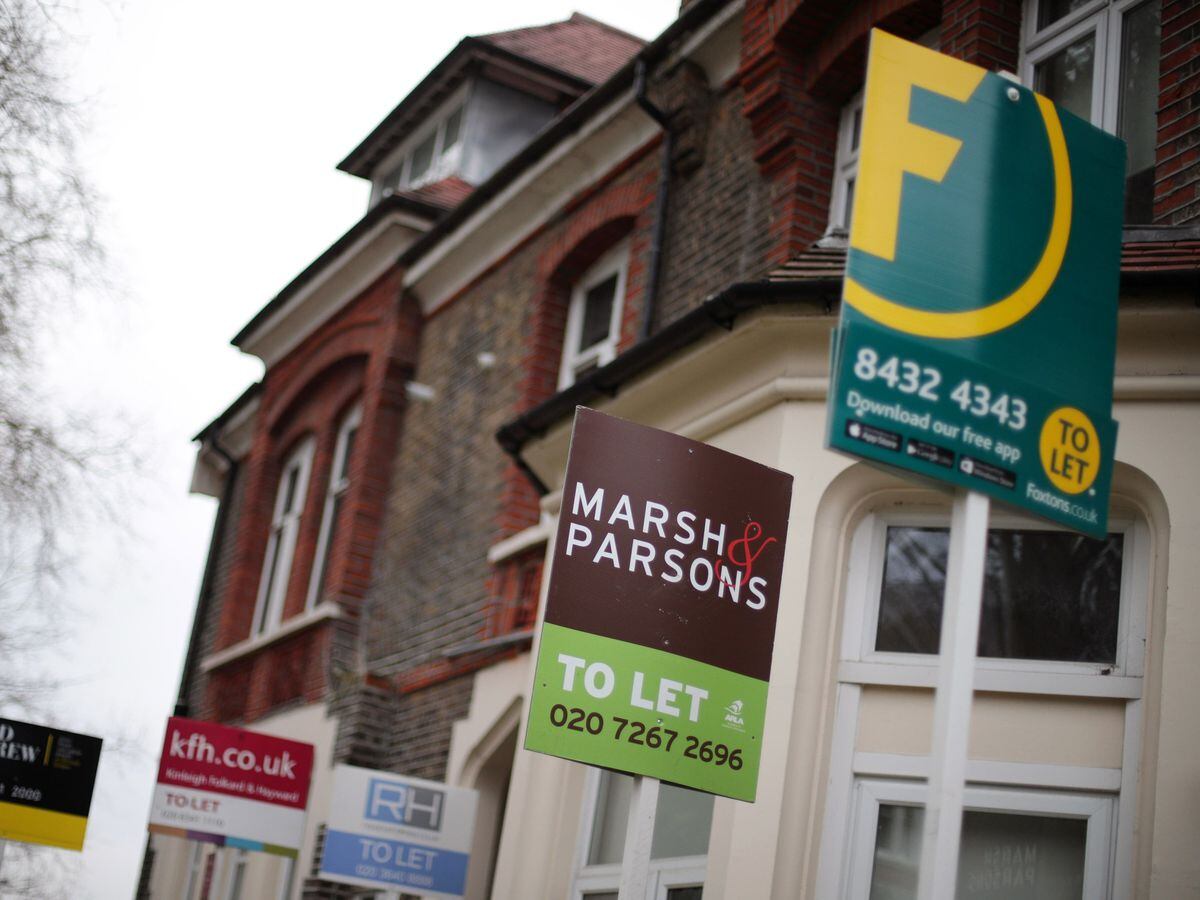 Estate agents' To Let signs outside houses