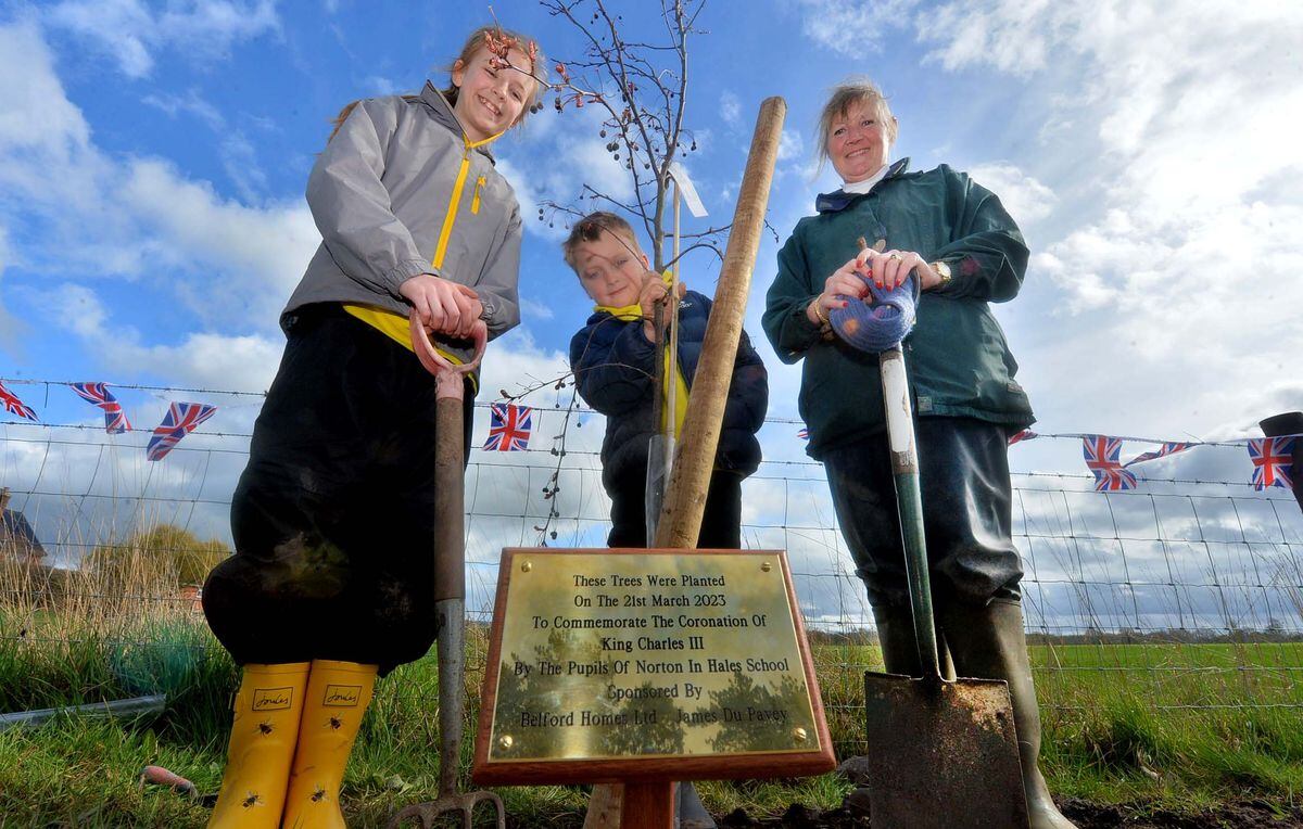 Norton in Hales pupils Evie and Jacob with Sarah Moulson, Chair of the In Bloom group, at the tree planting.