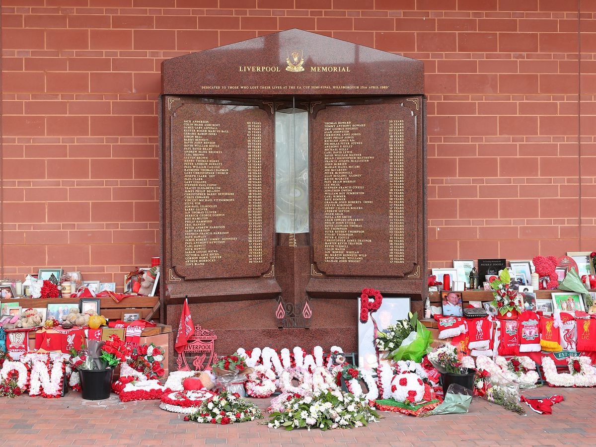 Flowers and tributes left at the Hillsborough Memorial outside Anfield 