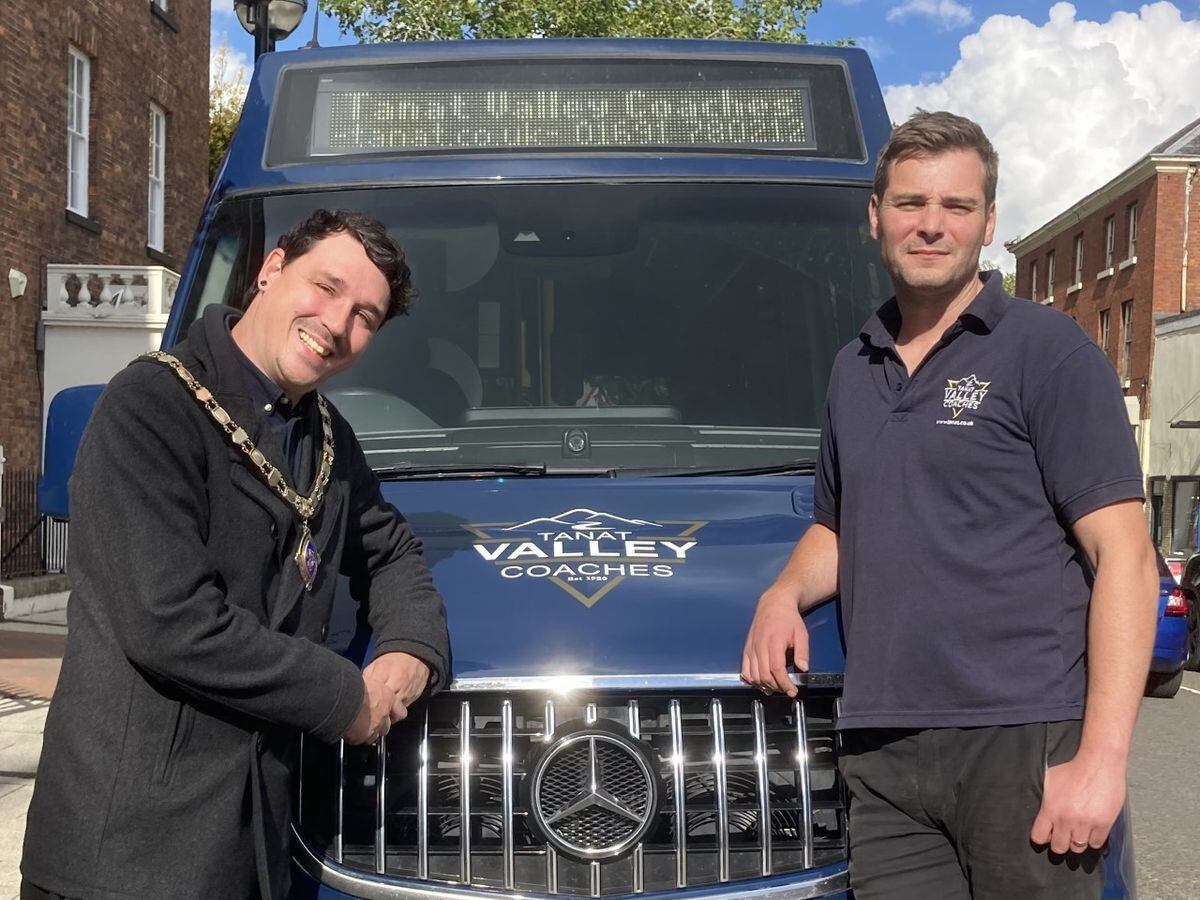 Director and transport manager of Tanat Valley Coaches, Trevor Wellstead and Oswestry Mayor Councillor Jay Moore