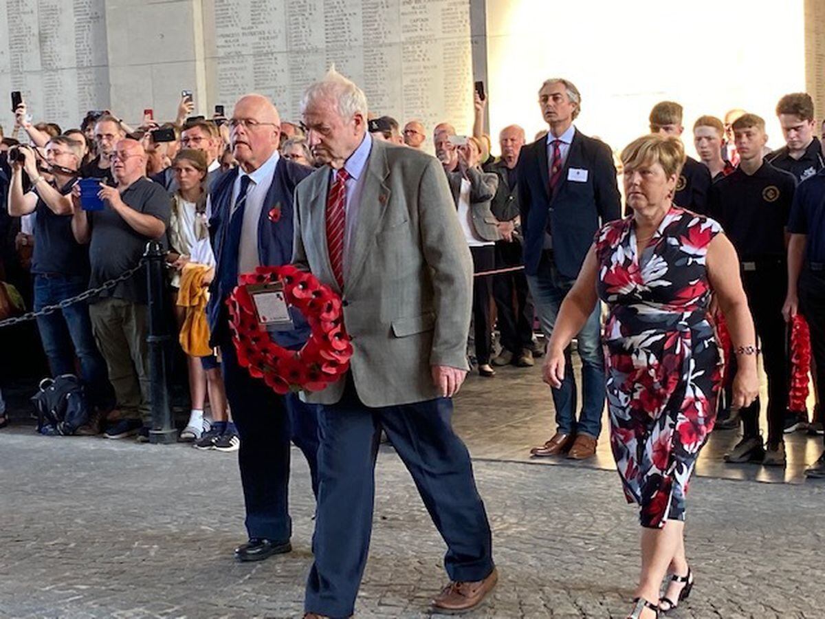 Allan Caswell, centre, lays a wreath at the Menin Gate memorial