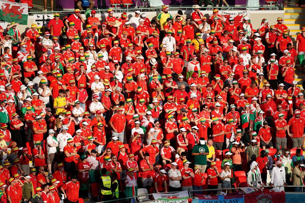 
              
Wales fans in the stands during the FIFA World Cup Group B match at the Ahmad Bin Ali Stadium, Al-Rayyan. Picture date: Friday November 25, 2022. PA Photo. See PA story WORLDCUP Wales. Photo credit should read: Mike Egerton/PA Wire.


RESTRICTIONS: Use subject to restrictions. Editorial use 
only, no commercial use without prior consent from rights holder.
            
