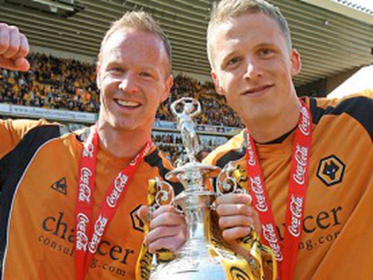 Skipper Jody Craddock with Berra after winning the Championship in 2009