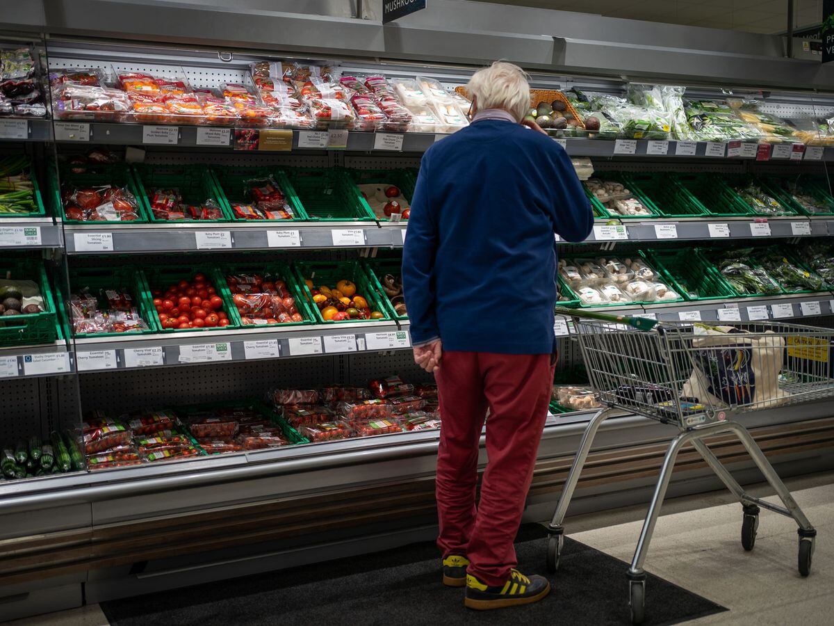 Man in fresh produce aisle