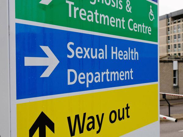 A sign for the sexual health department outside a hospital