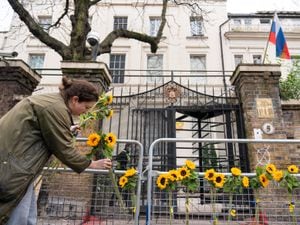 
              
A group of people supporting the Sunflower of Peace charity organisation place sunflowers outside the Russian Embassy in west London, to mark the first week of Russia's invasion of Ukraine. Picture date: Thursday March 3, 2022. See PA story POLITICS Ukraine. Photo credit should read: Dominic Lipinski/PA Wire
            
