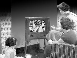 A family watching the Coronation of the Queen in 1953 on television