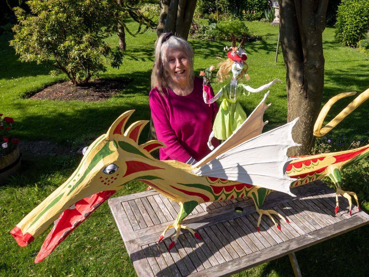 Margaret Lewery with her dragon and a sprite