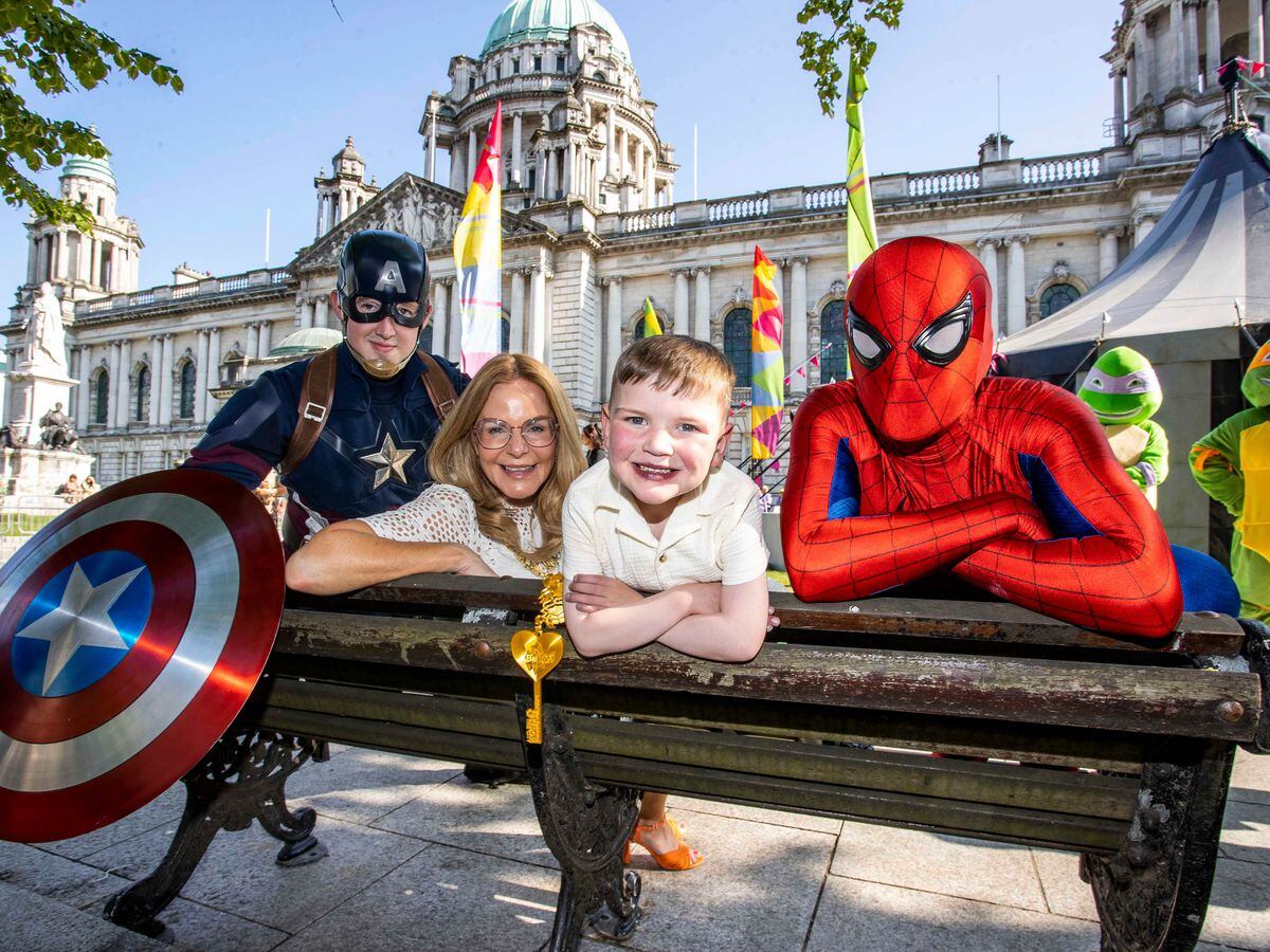 Six-year-old Daithi Mac Gabhann with Lord Mayor of Belfast Tina Black