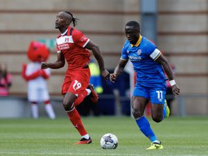 Dan Udoh of Shrewsbury Town and Omar Beckles of Leyton Orient (AMA)