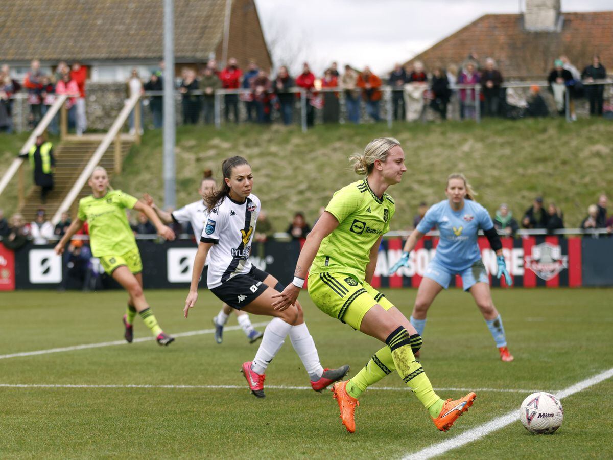 Lewes in action against Manchester United
