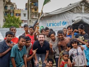 Martin Compston with children in Bangladesh