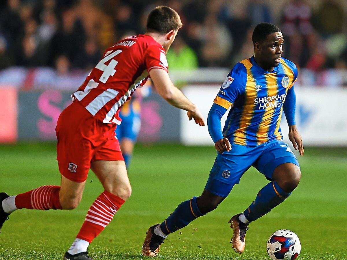 Christian Saydee of Shrewsbury Town and Will Aimson of Exeter City (AMA)