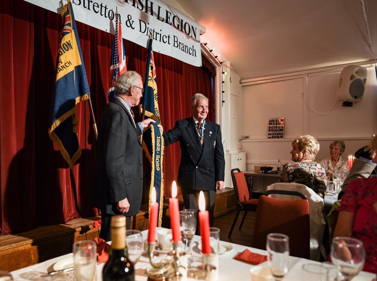  Deputy Lord Lieutenant of Shropshire, Col Michael Evans TD presenting the Centenary Pennant to Branch President Mr Nigel Marsden.  Photograph by Alys Harrison 