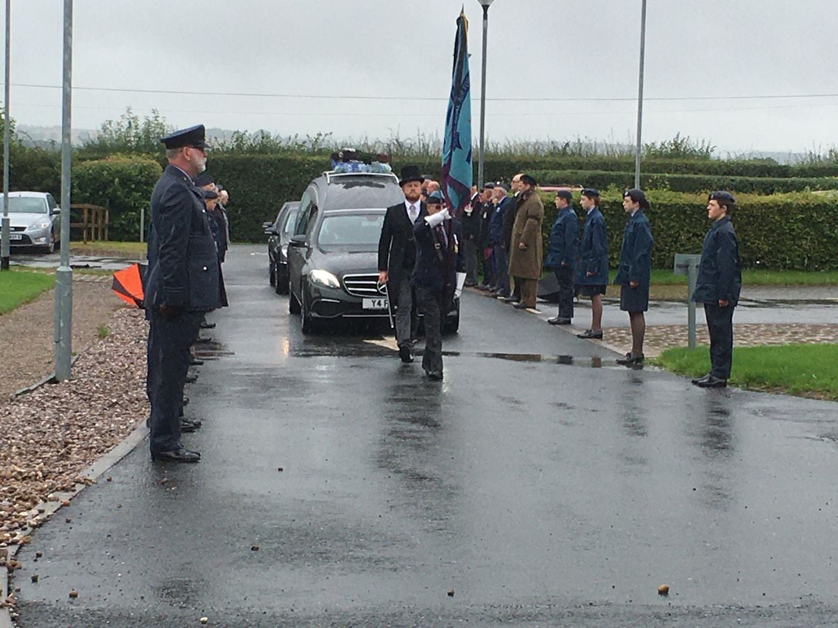 Military personnel lined the route at the funeral of Wilfred George Dawson, 99, a wireless operator and air gunner in RAF Bomber Command in the Second World War