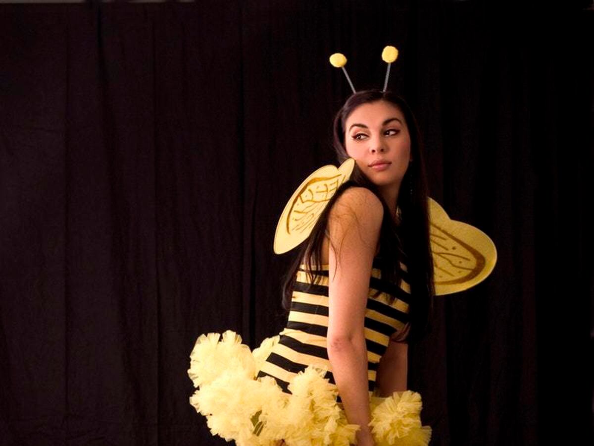 A girl in a bee costume
