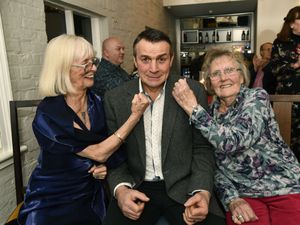 The Ironbridge & Coalbrookdale Civic Society Christmas dinner at the White Hart in Ironbridge. Former world champion boxer Richie Woodhall was a knockout guest of honour with chairman Viv Moore and Margaret Roberts. Picture by Dave Bagnall