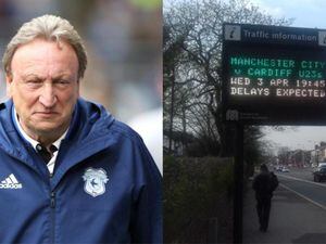Cardiff City manager Neil Warnock and a sign in Stockport