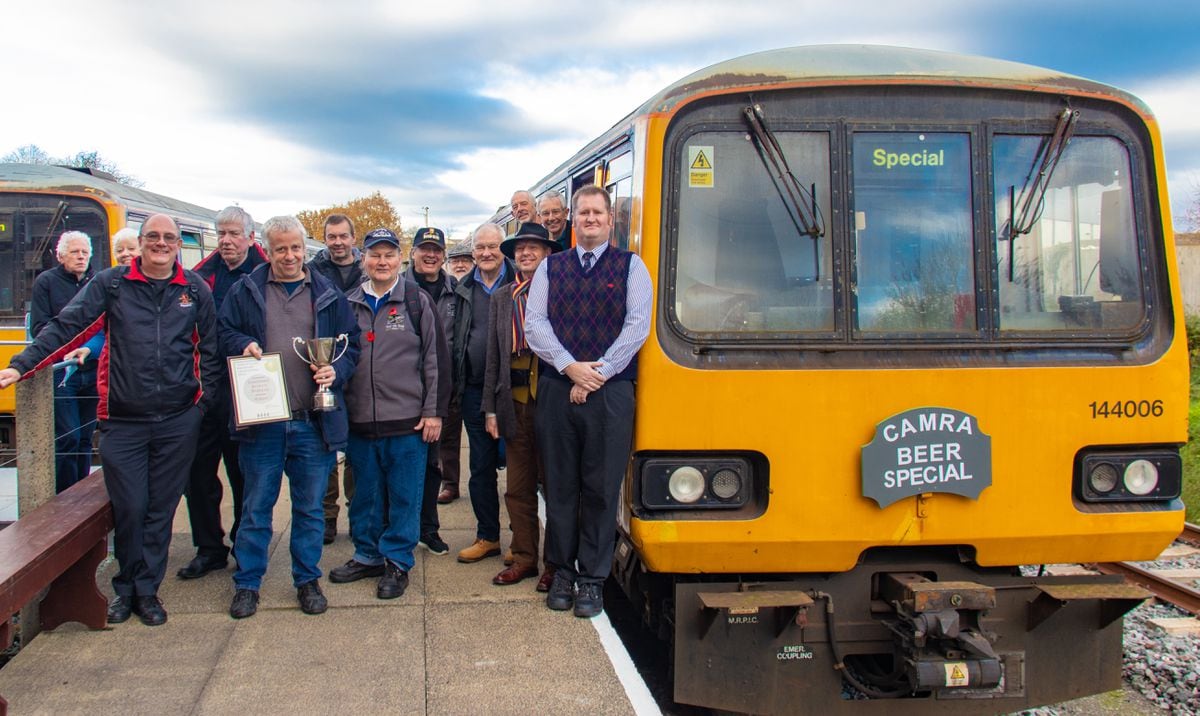 The presentation group arrive at Weston Wharf with the cup and certificate with driver Phil Bradley - a CAMRA member