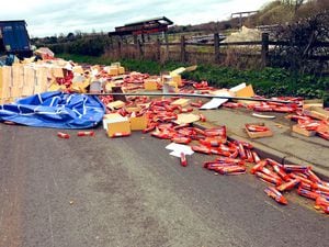Hundreds of toppled biscuit packets on the roadside in Sandiacre