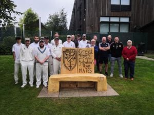 Much Wenlock Cricket Club gather around the bench on Saturday