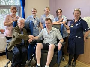 League of Friends acting chairman Michael Evans thanks Squirrel Manager, James Grant, in the specialist Milano chairs, with members of Ludlow hospital team