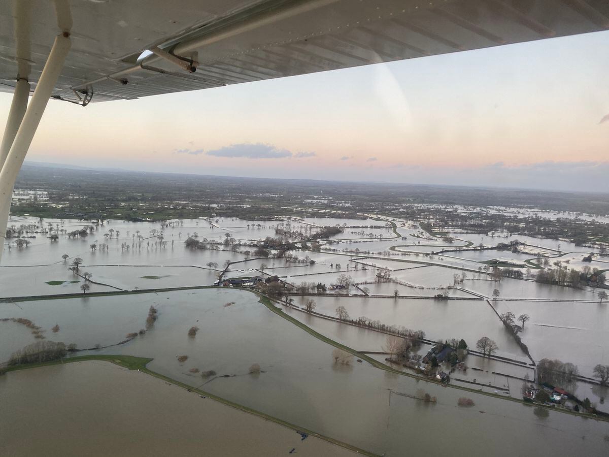 Fields outside Shrewsbury were left completely underwater Photo: Bruce Buglass