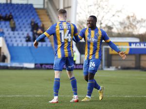 Rob Street of Shrewsbury Town celebrates after scoring a goal to make it 1-0 with Christian Saydee of Shrewsbury Town..