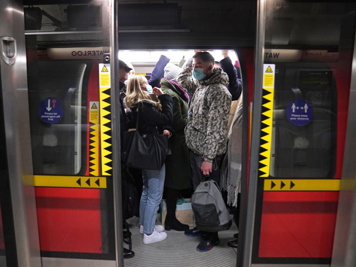 Commuters cram into the carriage of a Jubilee line train at Waterloo station in London