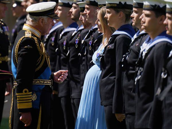 King presents Royal Victorian Order honours