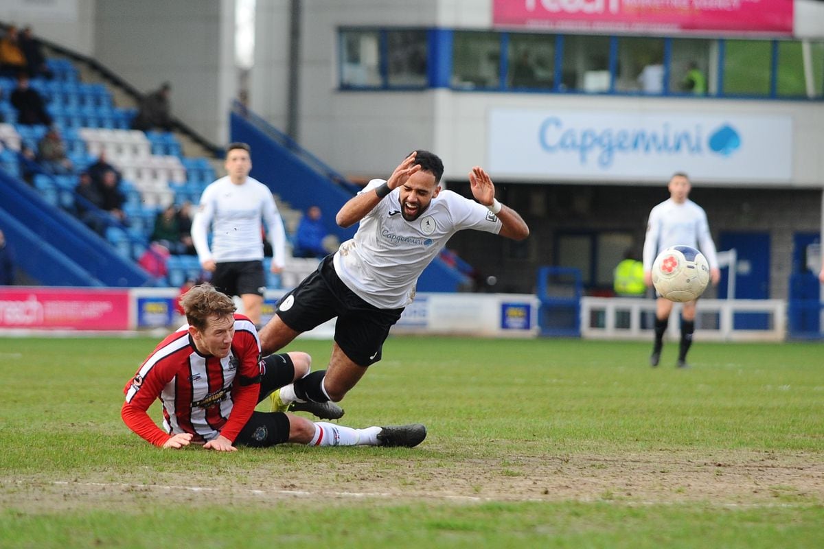 TELFORD COPYRIGHT MIKE SHERIDAN Brendon Daniels of Telford is fouled during the Vanarama Conference North fixture between AFC Telford United and Altrincham at The New Bucks Head on Saturday, February 1, 2020...Picture credit: Mike Sheridan/Ultrapress..MS201920-044.