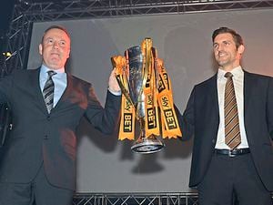 Kenny Jackett and Sam Ricketts celebrate promotion in 2014.