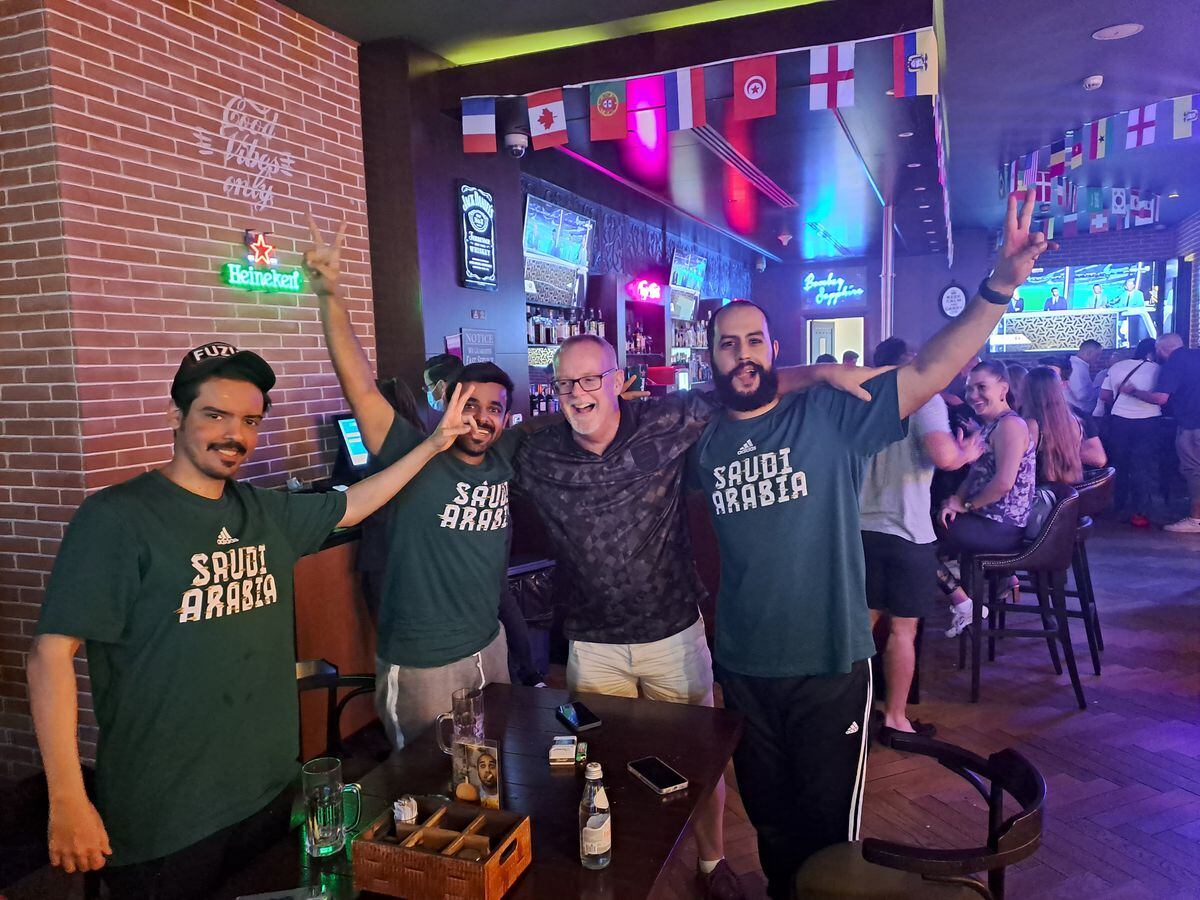 Graeme with Saudi Arabian fans celebrating their win over Argentina.