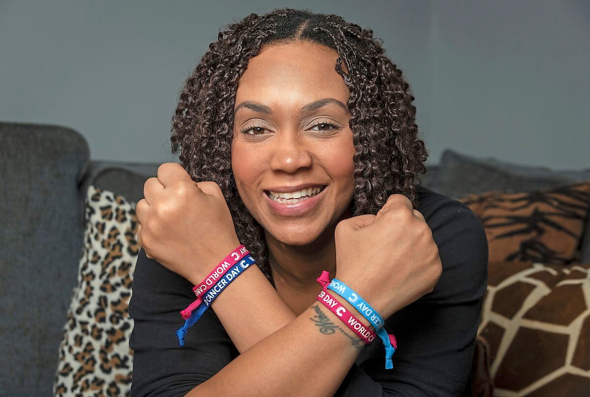 Appeal – Cancer survivor and mother of three Justine Harris promotes World Cancer Day by encouraging people to donate through the Unity band
