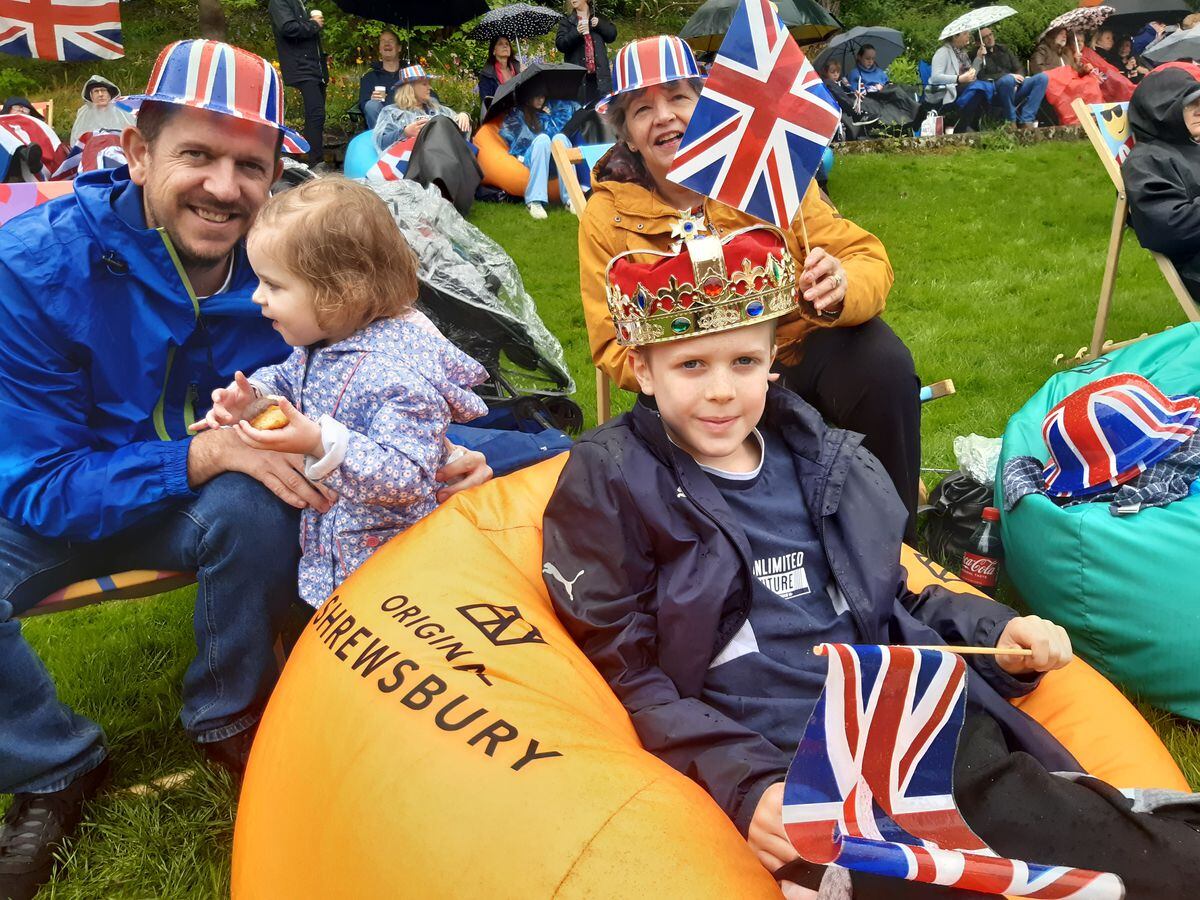 Pictured are "king" Charlie Taylor, aged nine, on his bean bag throne, with dad Matt Taylor, sister Rosie, aged two, with Matt's mum Linda Webster