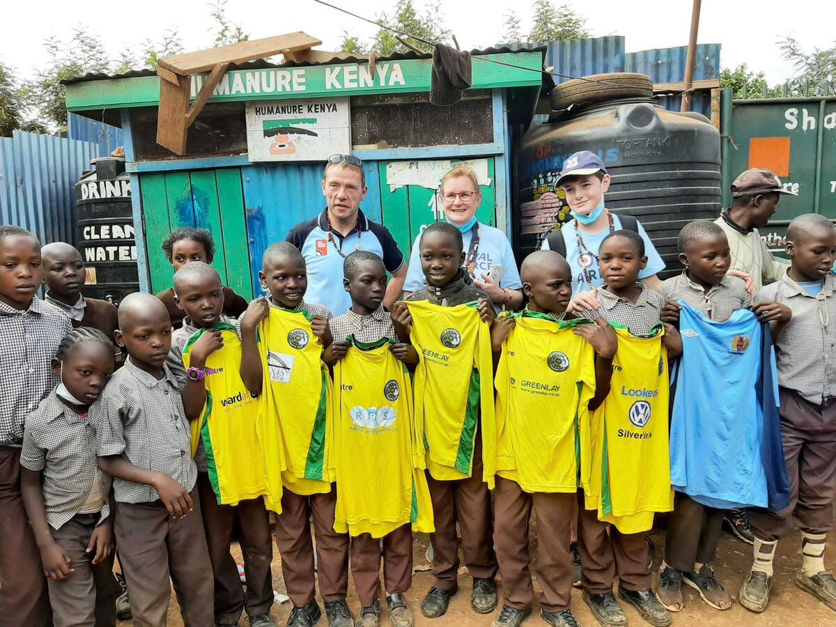 Some of the children with kit from a previous visit