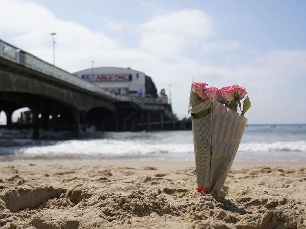 A bunch of flowers left on Bournemouth beach