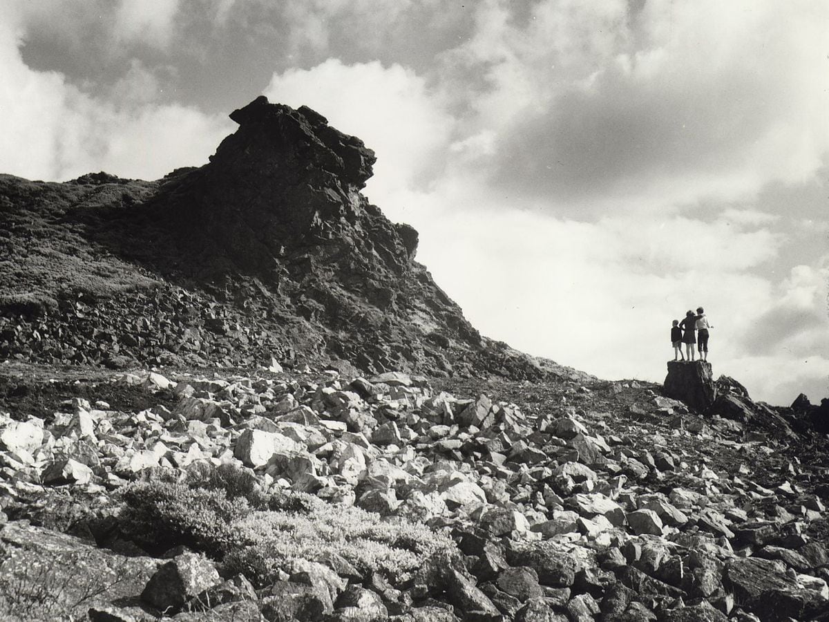 Some young visitors take a look at the Devil's Chair on the Stiperstones in 1958. Picture: S.R. Turner