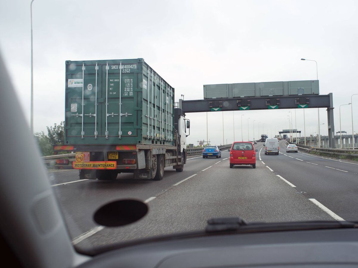 A vehicle about to overtake a lorry