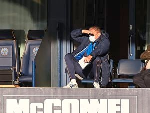 Steve Cotterill watches Shrewsbury from the stands