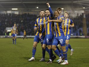 Luke Leahy of Shrewsbury Town celebrates with his team mates after scoring a goal to make it 5-1 (AMA)