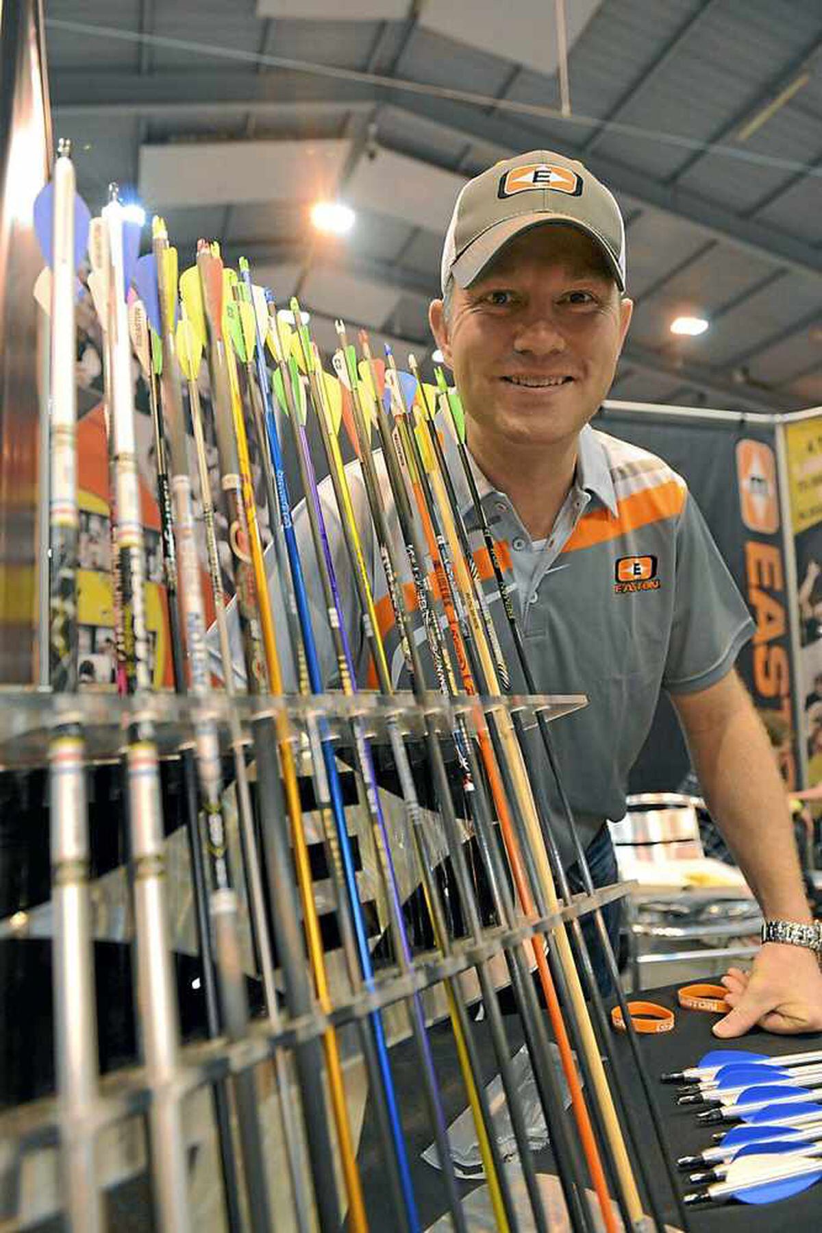 Logan Wilde, from archery firm Easton, with a display of arrows