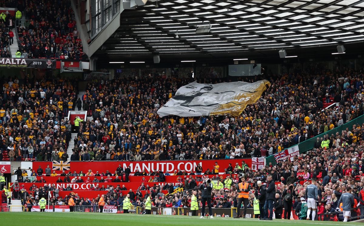 Wolves fans with the Carl Ikeme banner at Old Trafford in September