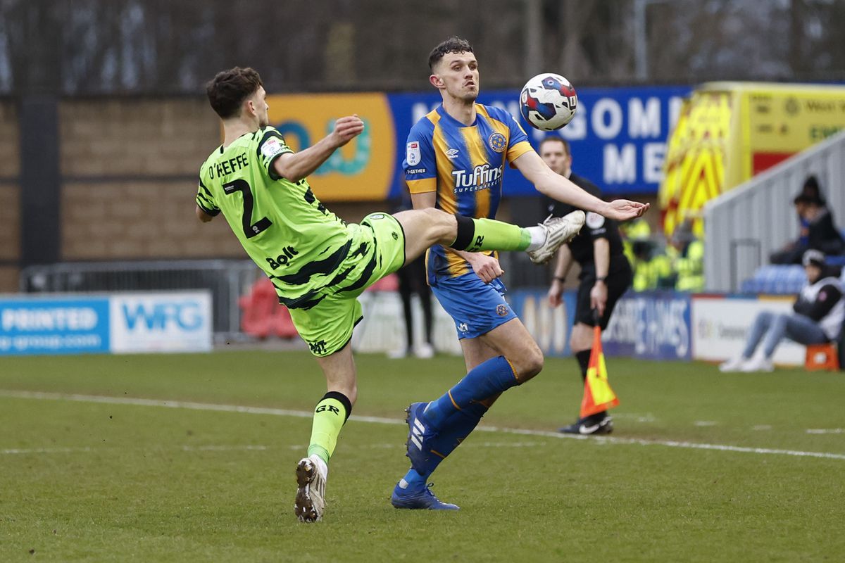 Tom Flanagan of Shrewsbury Town and Corey O'Keeffe of Forest Green Rovers (AMA)
