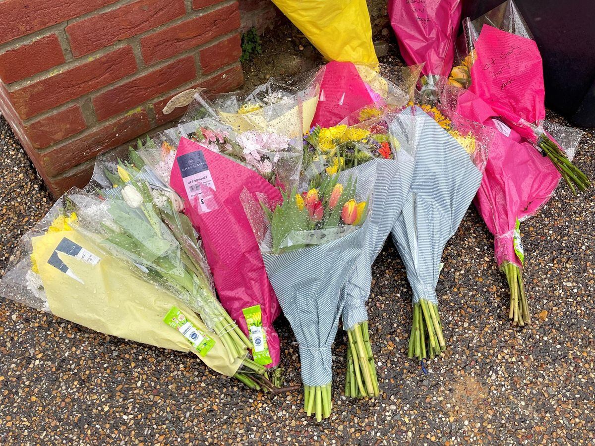 Floral tributes outside the home of Gary Dunmore, 57, who was shot dead in Sutton, Cambridgeshire. (Sam Russell/ PA)