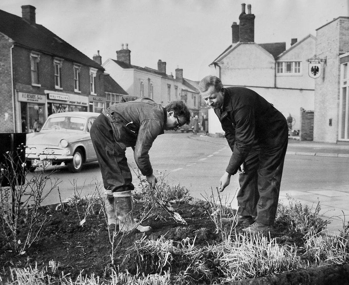 Planting outside what was the Lord Hill pub, at the junction of King Street and the High Street. 