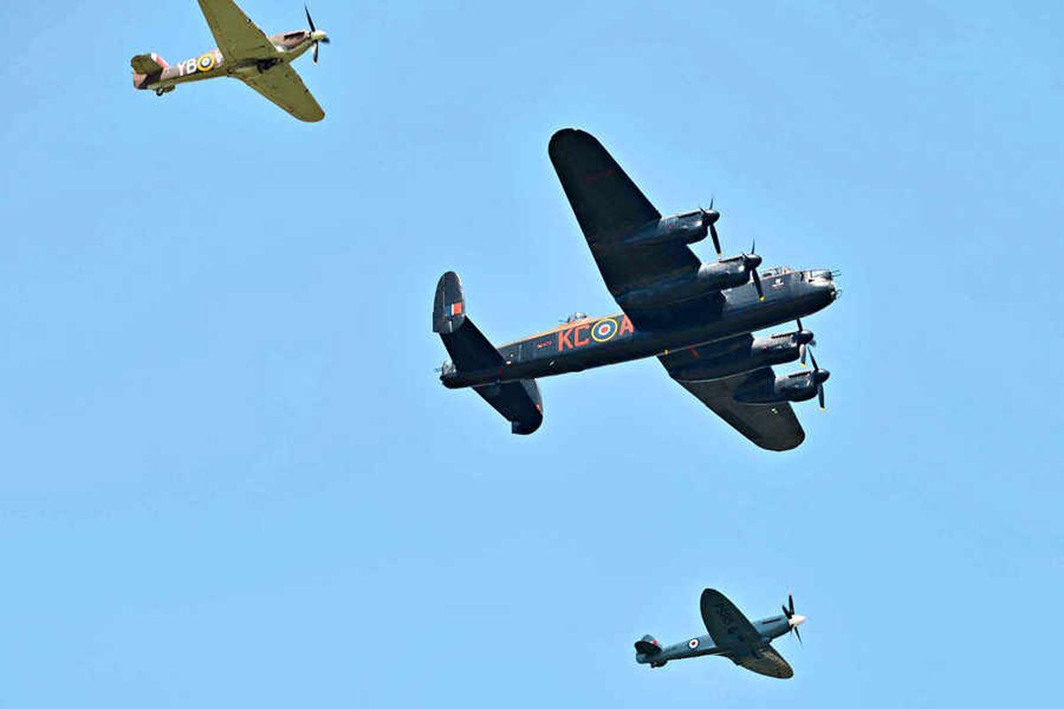 The Battle of Britain Flight  famous World War II planes, the Lancaster, Hurricane and Spitfire, fly past during the 75th air show at RAF?Cosford 